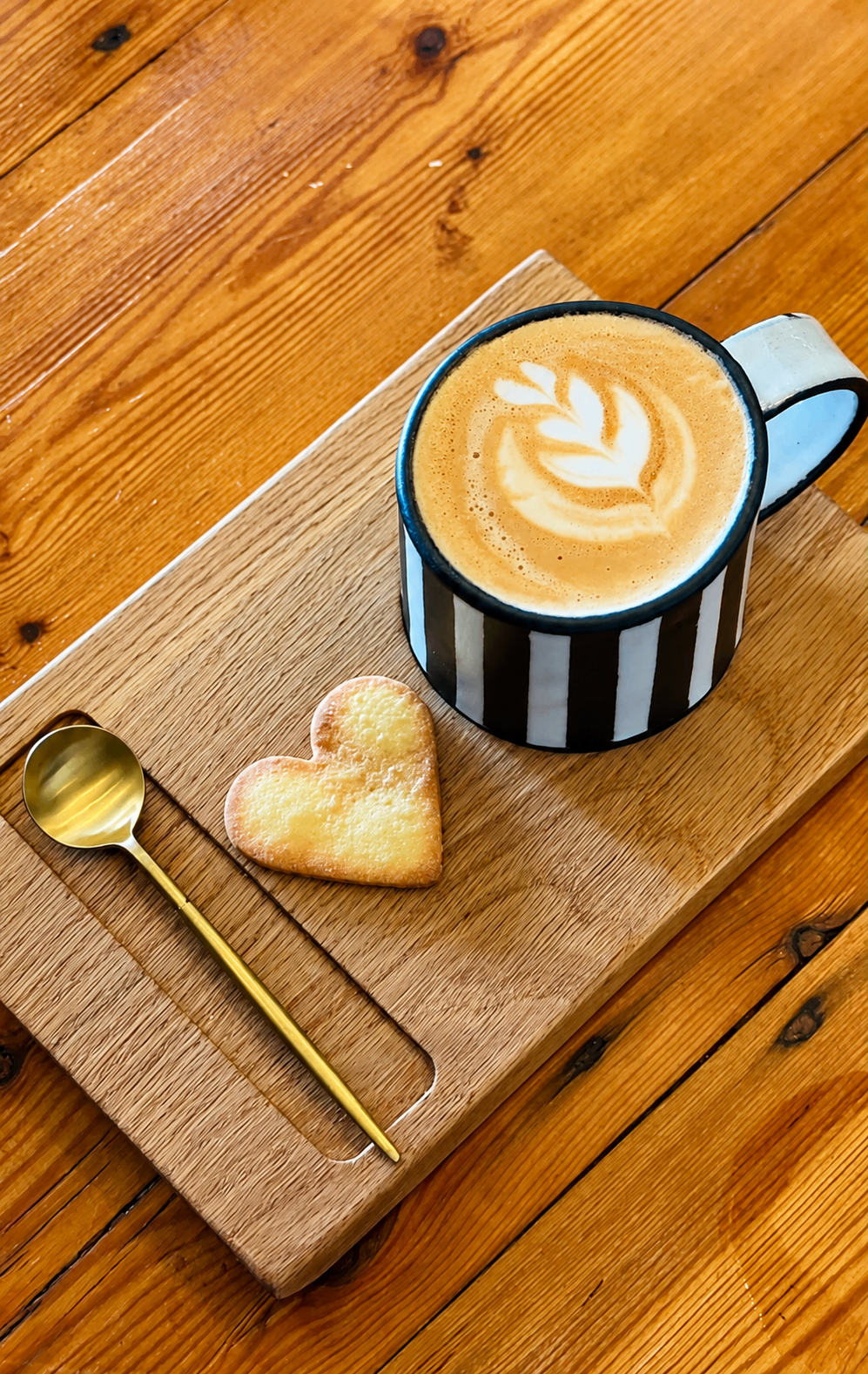 Freshly poured latte with heart art